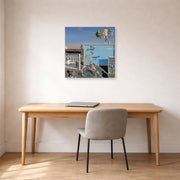 Gallery-wrapped canvas print of Salvador Dali's Illumined Pleasures displayed on a wall in a office