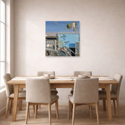 Unframed poster print of Salvador Dali's Illumined Pleasures displayed on a wall in a dining room
