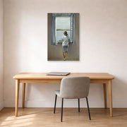 Unframed poster print of Salvador Dali's Person at the Window displayed on a wall in a office