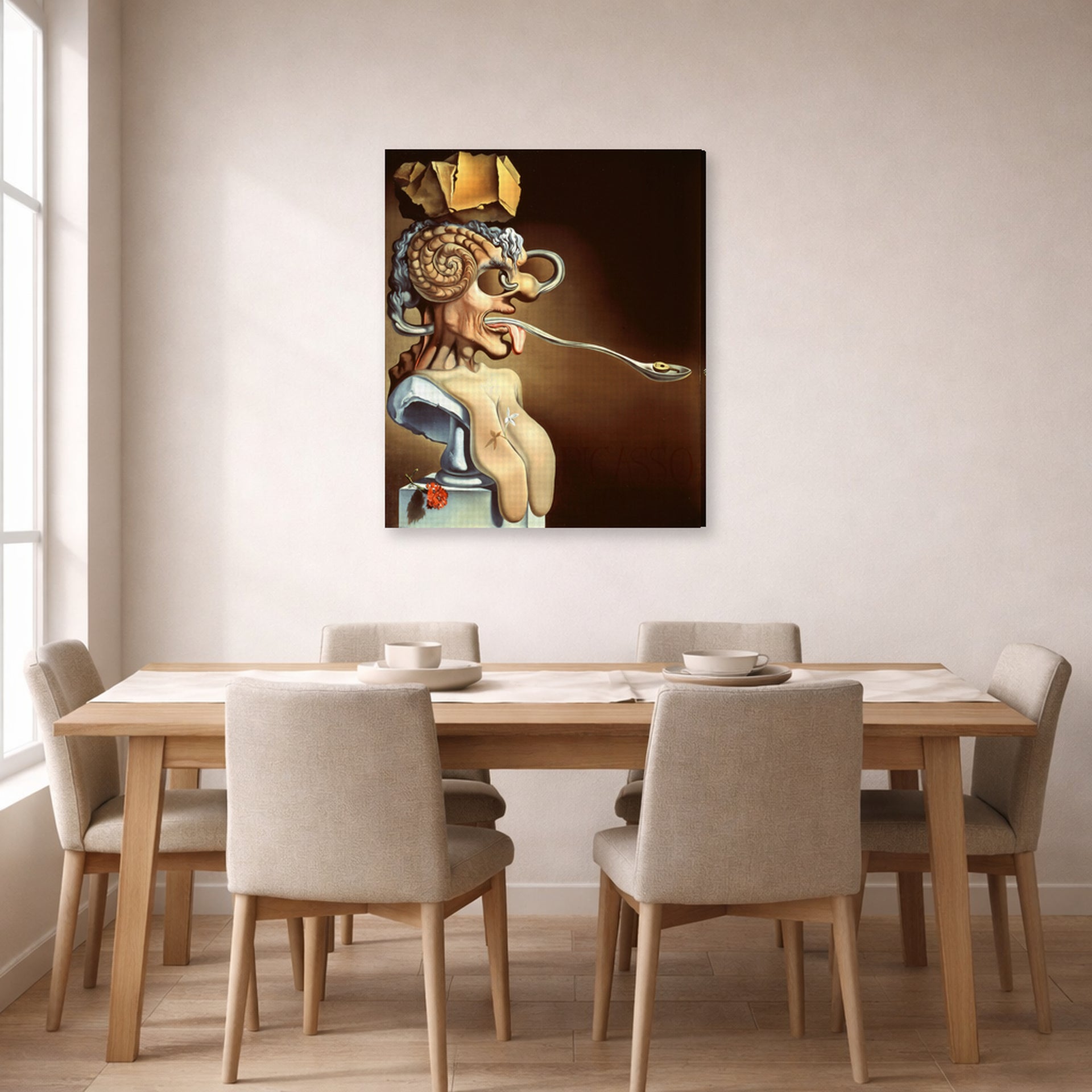 Gallery-wrapped canvas print of Salvador Dali's Portrait of Picasso displayed on a wall in a dining room