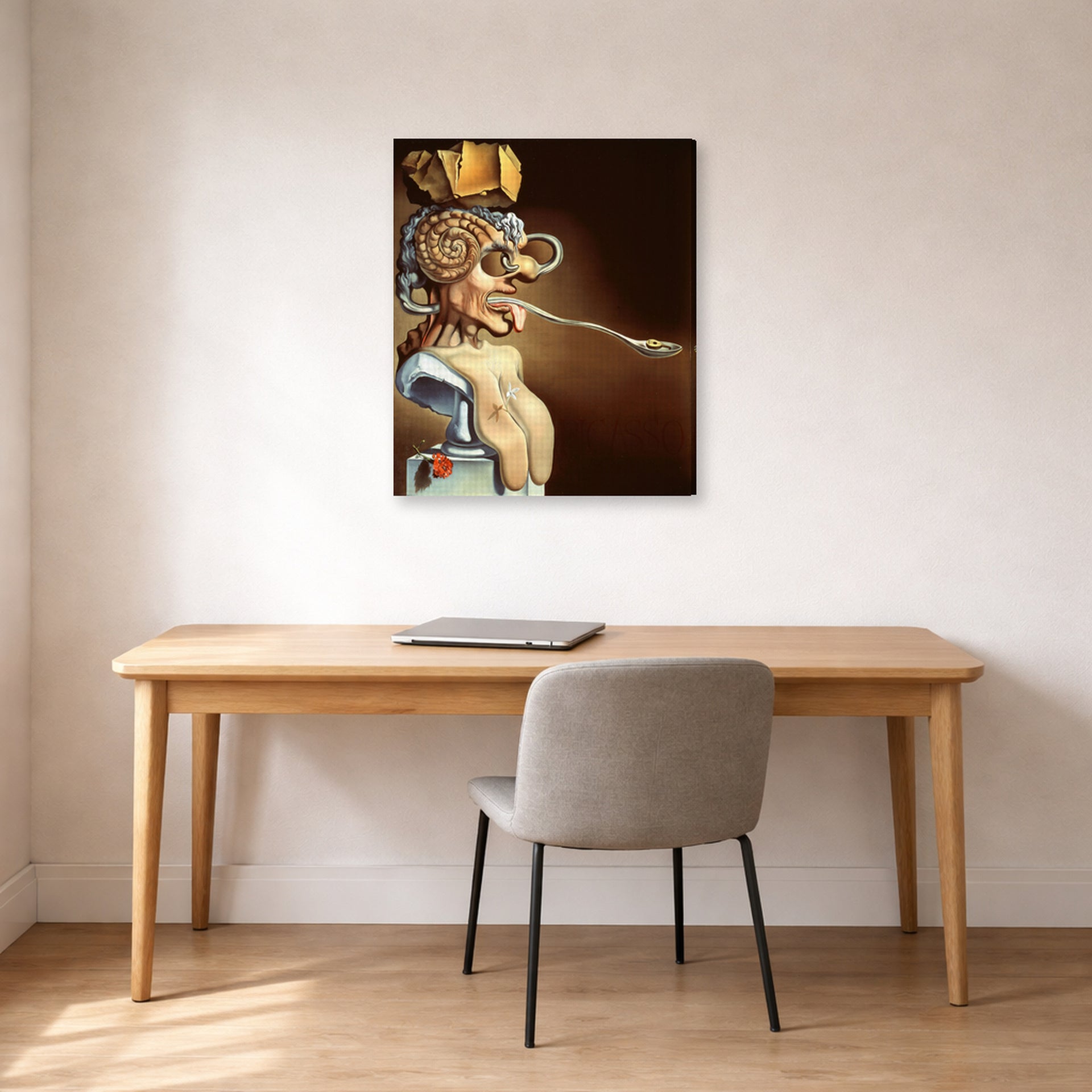 Gallery-wrapped canvas print of Salvador Dali's Portrait of Picasso displayed on a wall in a office