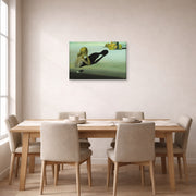Gallery-wrapped canvas print of Salvador Dali's Remorse or Sphinx Embedded in the Sand displayed on a wall in a dining room