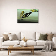 Gallery-wrapped canvas print of Salvador Dali's Remorse or Sphinx Embedded in the Sand displayed on a wall in a living room