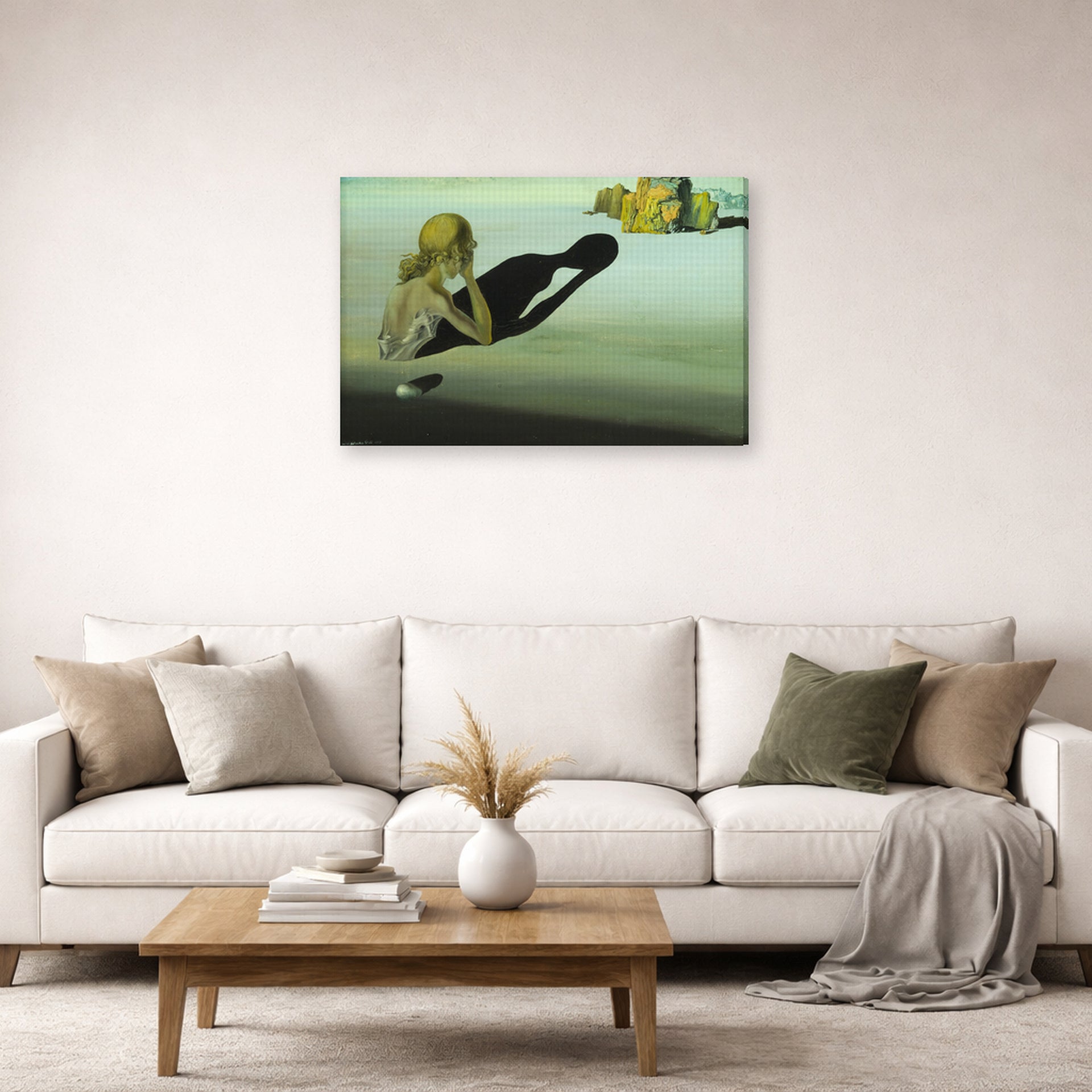 Gallery-wrapped canvas print of Salvador Dali's Remorse or Sphinx Embedded in the Sand displayed on a wall in a living room