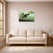 Unframed poster print of Salvador Dali's Remorse or Sphinx Embedded in the Sand displayed on a wall in a living room