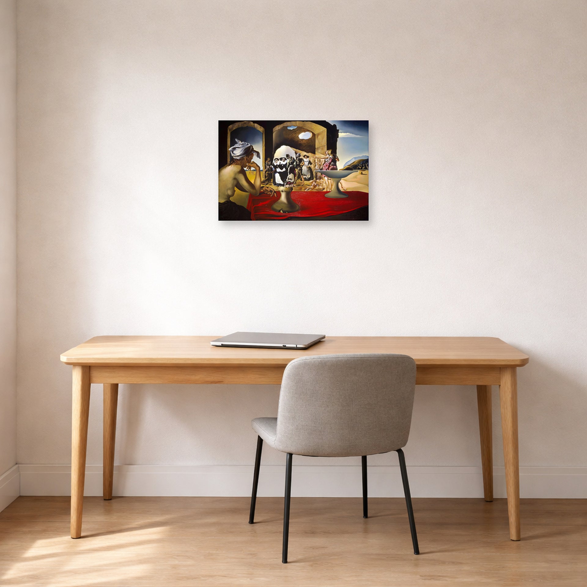 Unframed poster print of Salvador Dali's Slave Market with the Disappearing Bust of Voltaire displayed on a wall in a office
