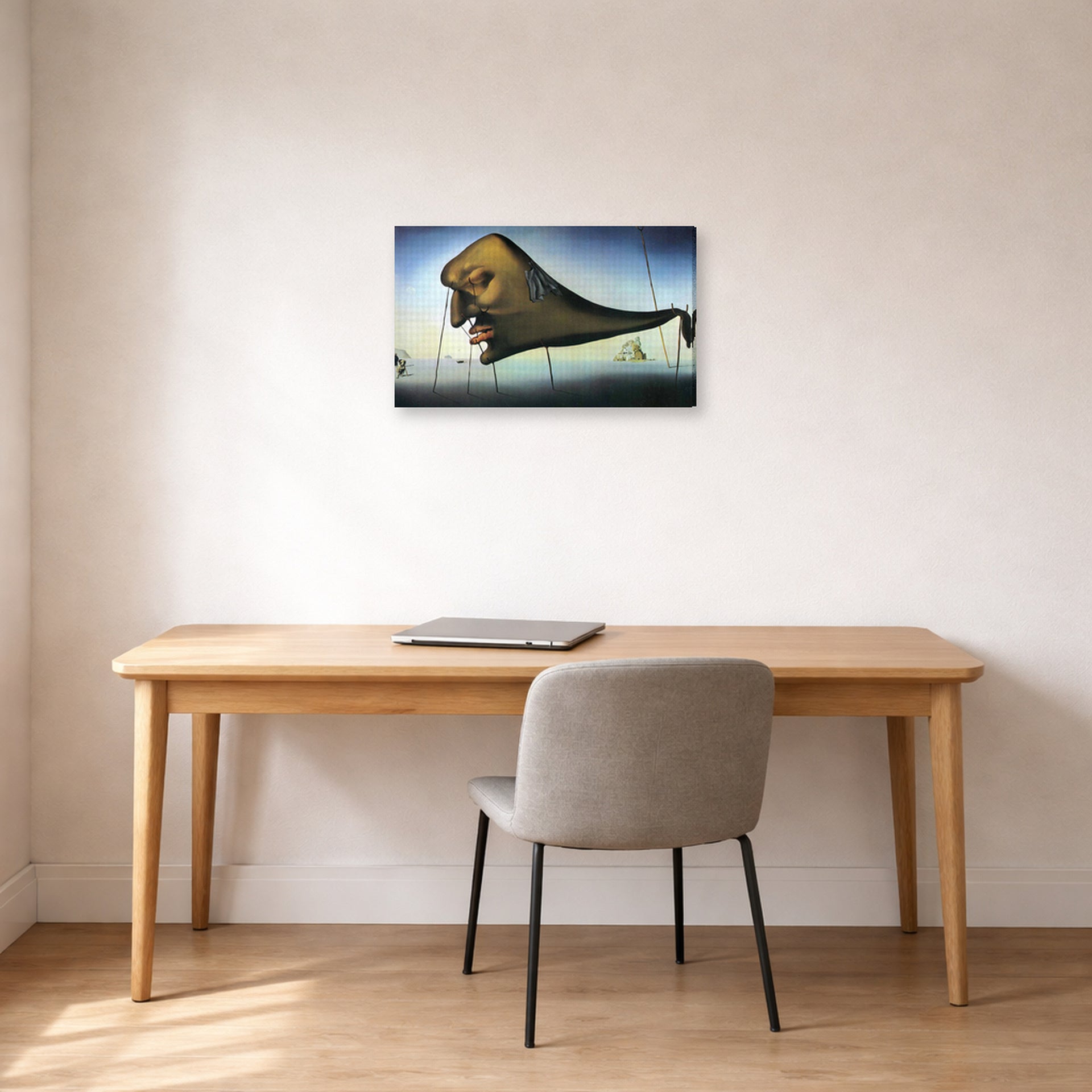 Gallery-wrapped canvas print of Salvador Dali's Sleep displayed on a wall in a office