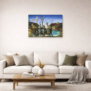 Gallery-wrapped canvas print of Salvador Dali's Swans Reflecting Elephants displayed on a wall in a living room