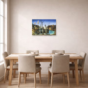 Unframed poster print of Salvador Dali's Swans Reflecting Elephants displayed on a wall in a dining room