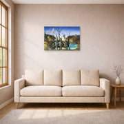 Unframed poster print of Salvador Dali's Swans Reflecting Elephants displayed on a wall in a living room