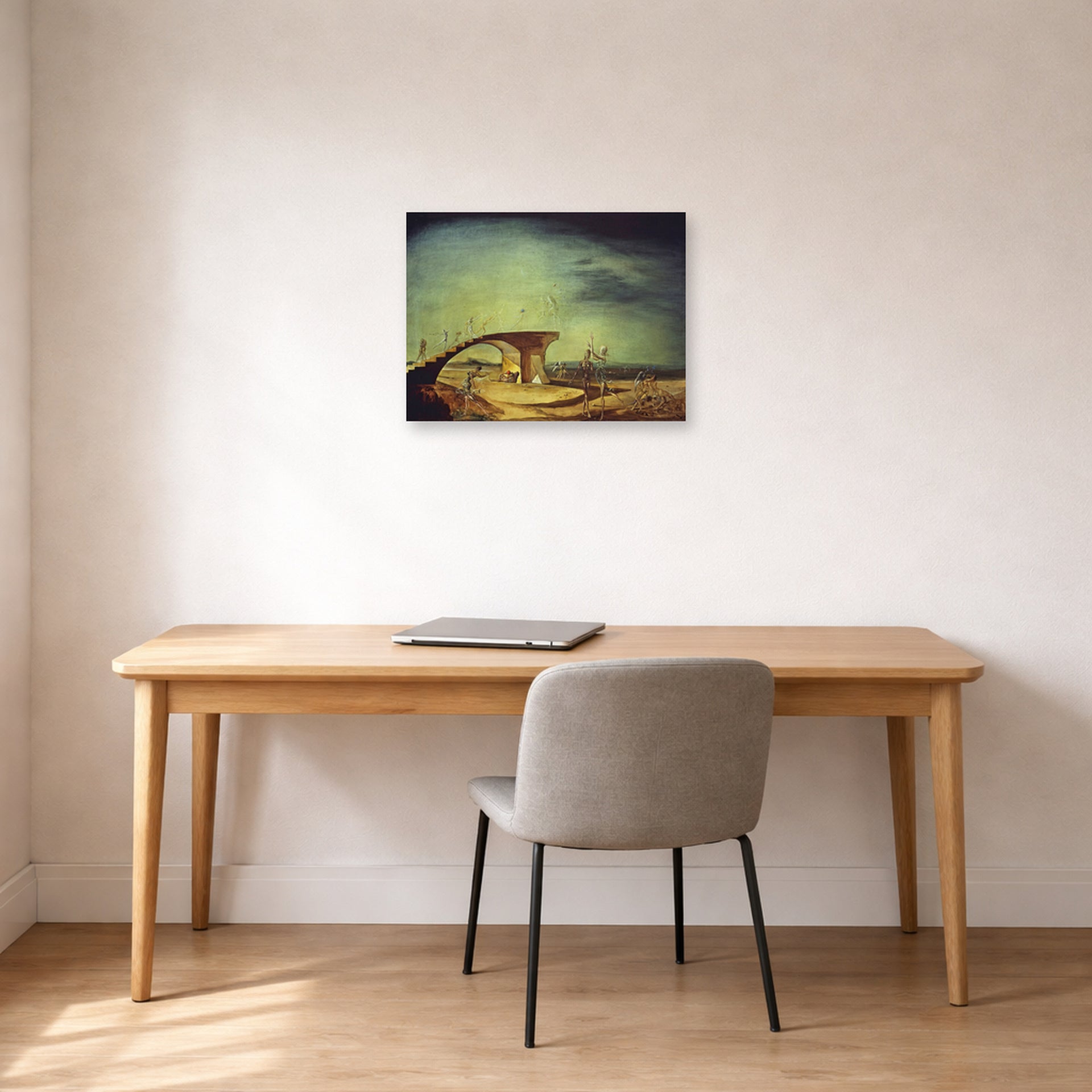 Unframed poster print of Salvador Dali's Broken Bridge and the Dream displayed on a wall in a office