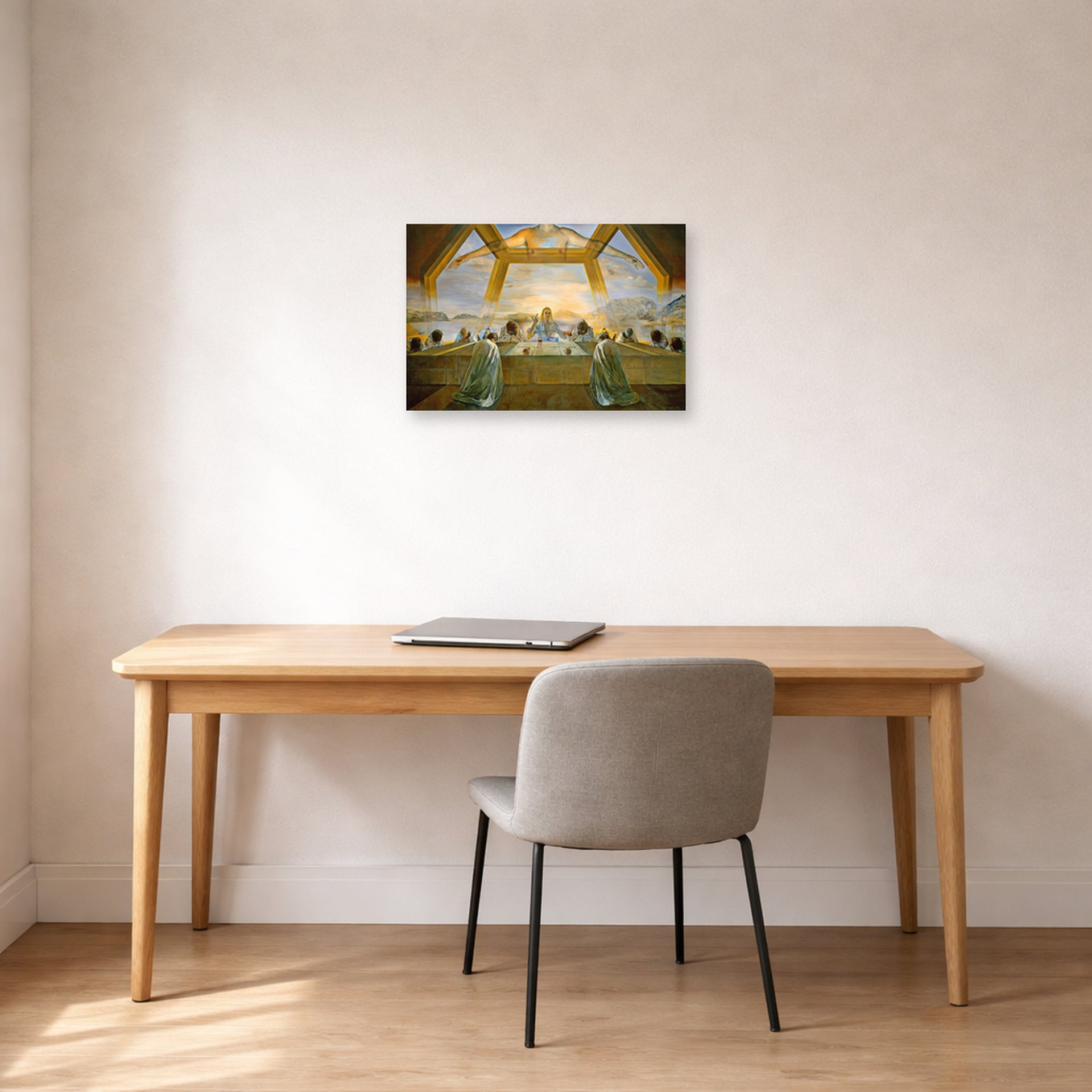 Unframed poster print of Salvador Dali's Sacrament of the Last Supper displayed on a wall in a office