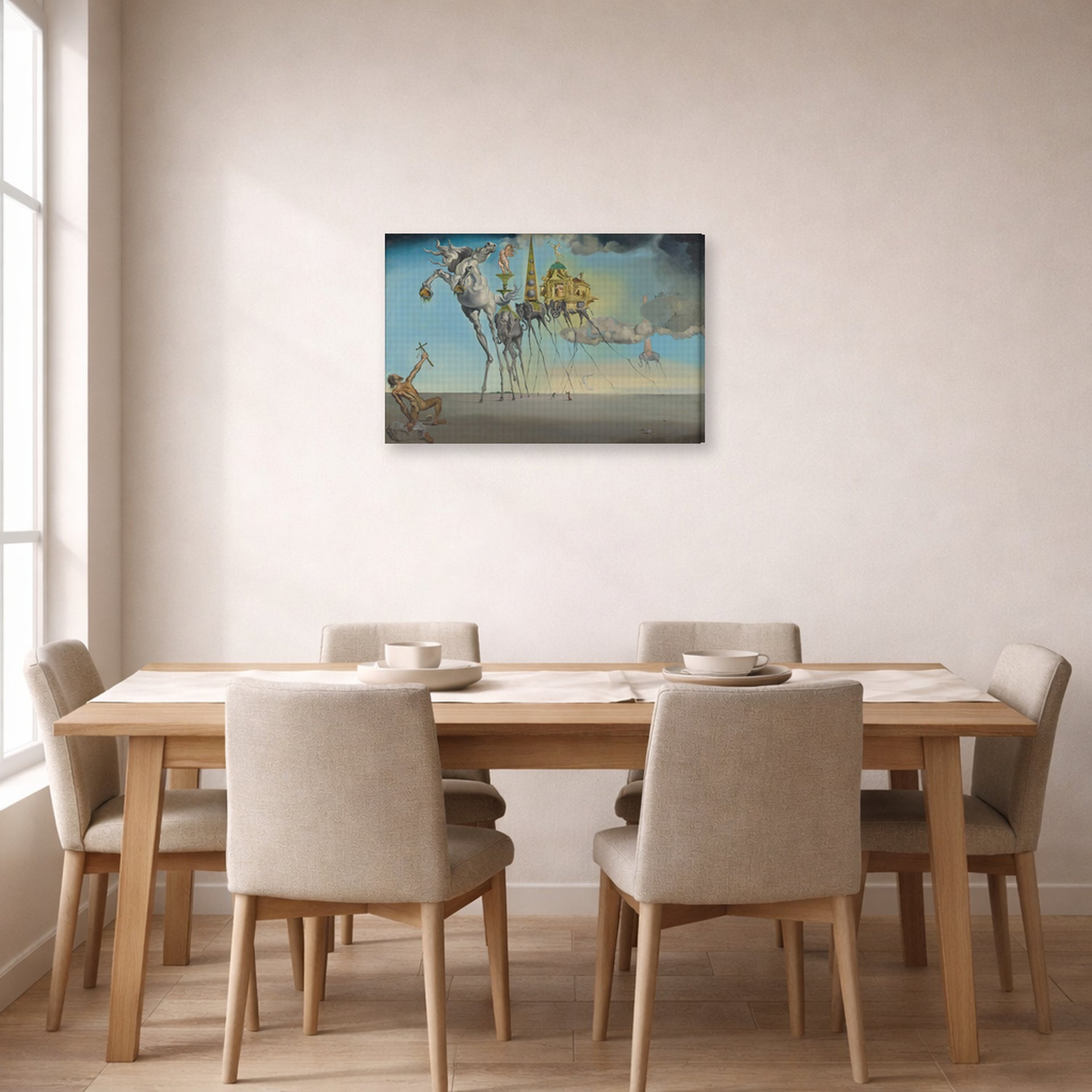 Gallery-wrapped canvas print of Salvador Dali's The Temptation of St. Anthony displayed on a wall in a dining room