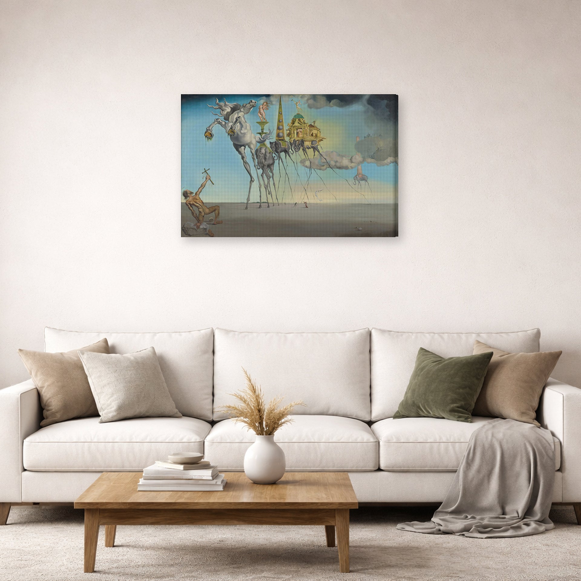 Gallery-wrapped canvas print of Salvador Dali's The Temptation of St. Anthony displayed on a wall in a living room