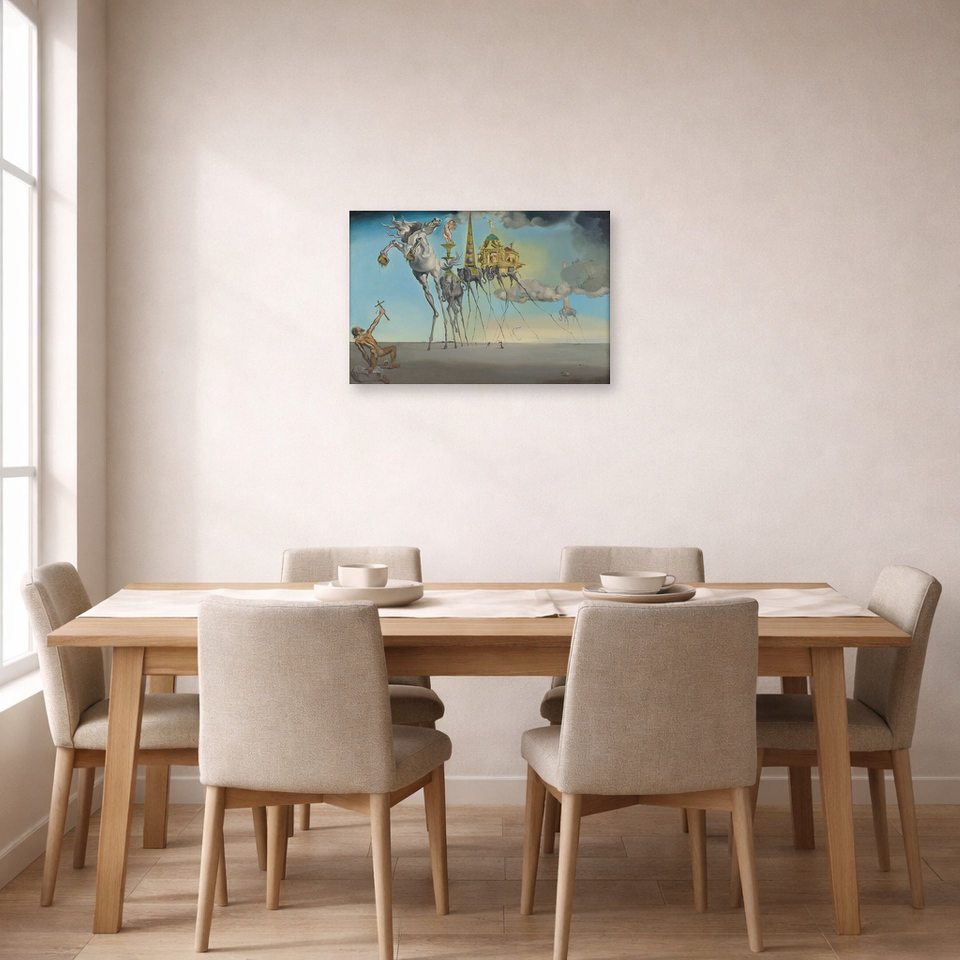 Unframed poster print of Salvador Dali's The Temptation of St. Anthony displayed on a wall in a dining room