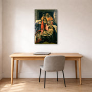 Unframed poster print of Sandro Botticelli's Lamentation over the Dead Christ displayed on a wall in an office