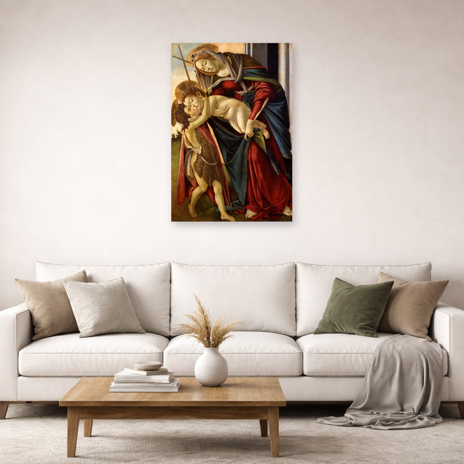 Unframed poster print of Sandro Botticelli's Madonna and Child with John the Baptist displayed on a wall in a living room