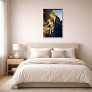 Unframed poster print of Sandro Botticelli's Madonna of the Book displayed on a wall in a bedroom