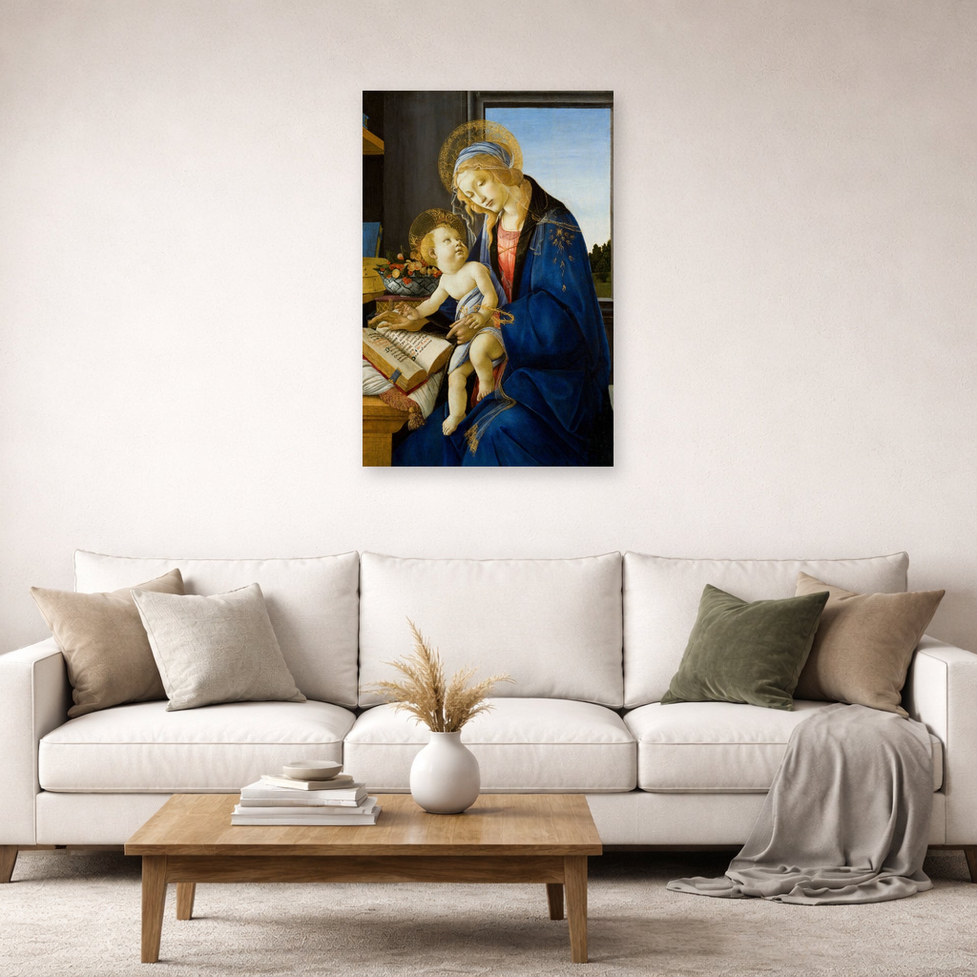 Unframed poster print of Sandro Botticelli's Madonna of the Book displayed on a wall in a living room