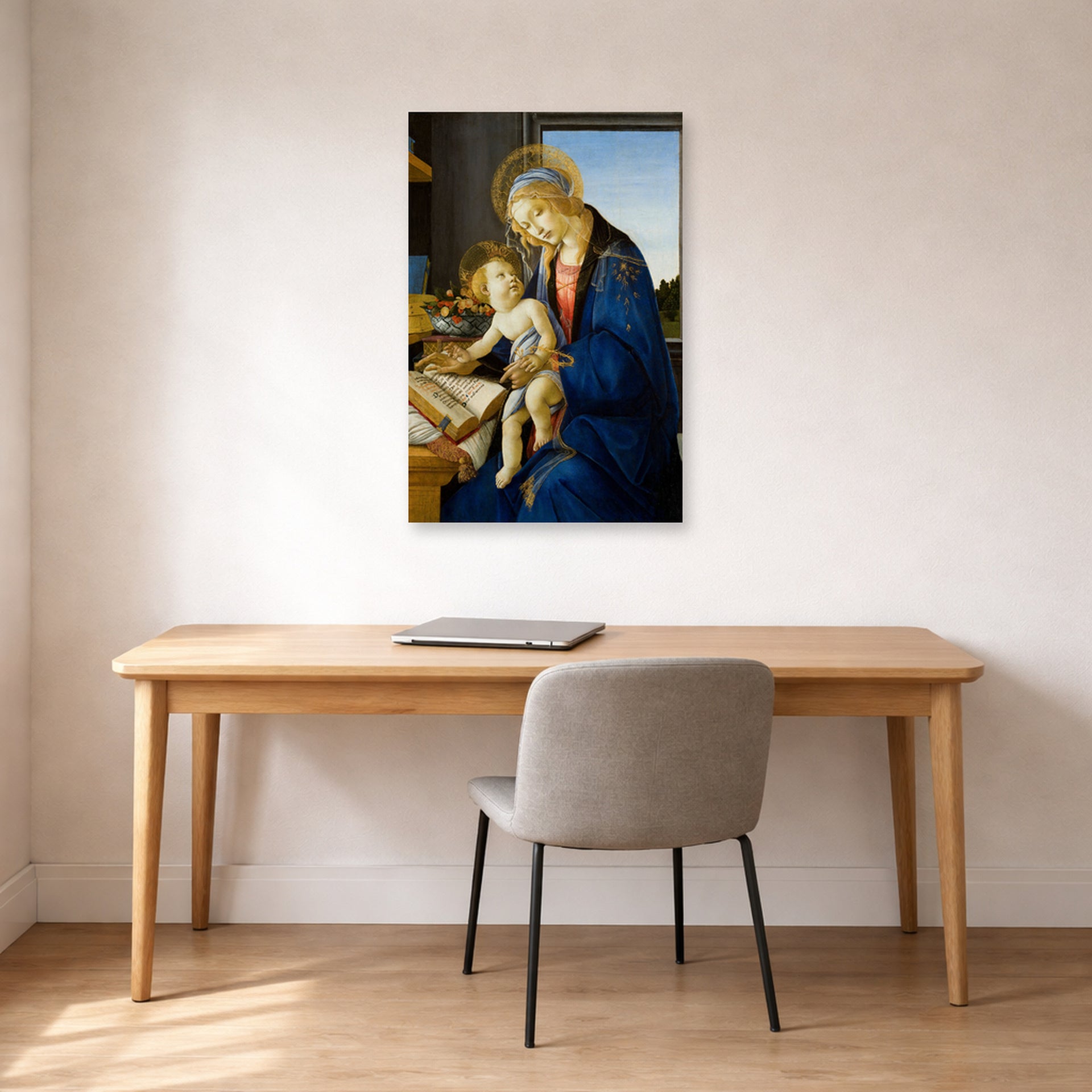 Unframed poster print of Sandro Botticelli's Madonna of the Book displayed on a wall in an office