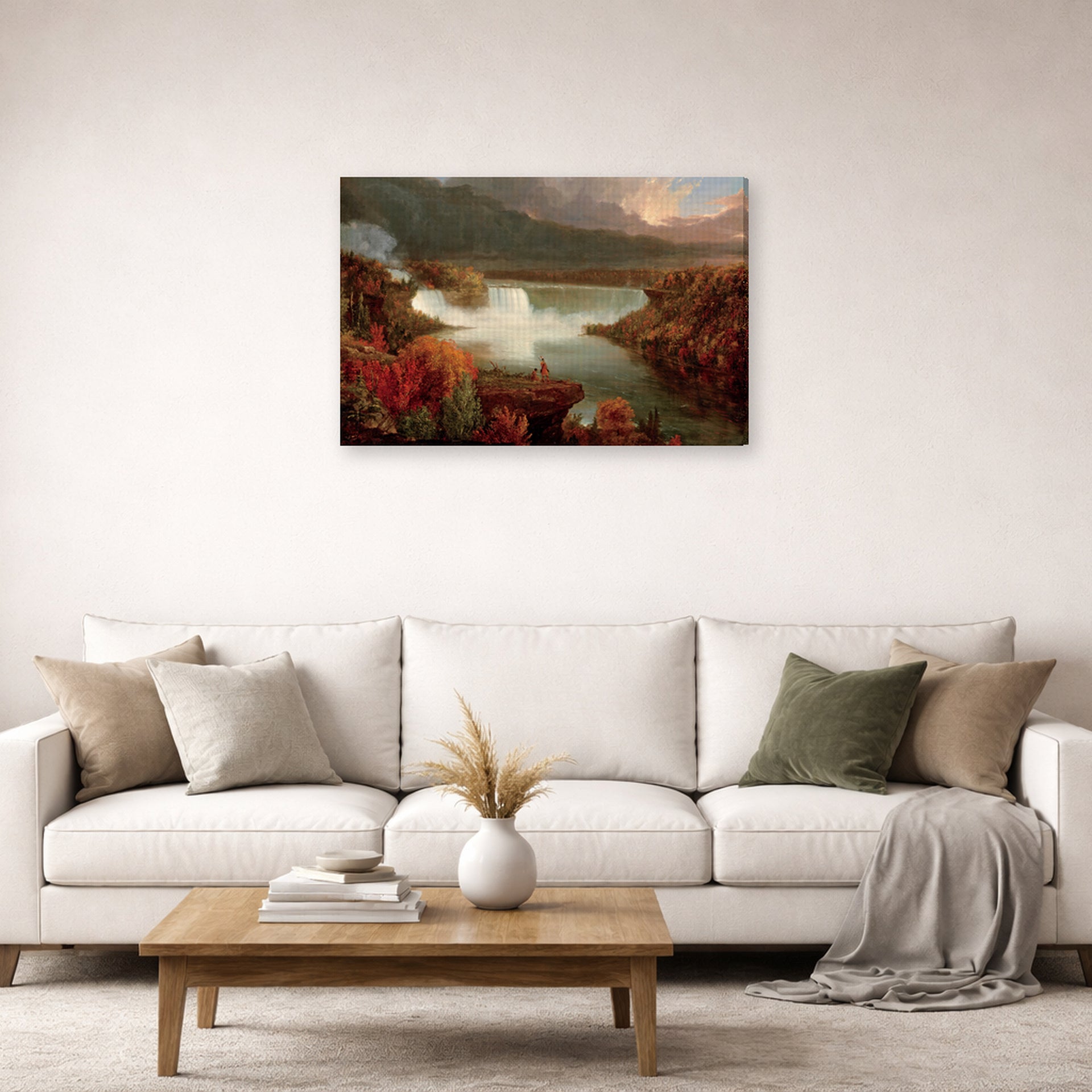 Gallery-wrapped canvas print of Thomas Cole's Distant View of Niagara Falls displayed on a wall in a living room