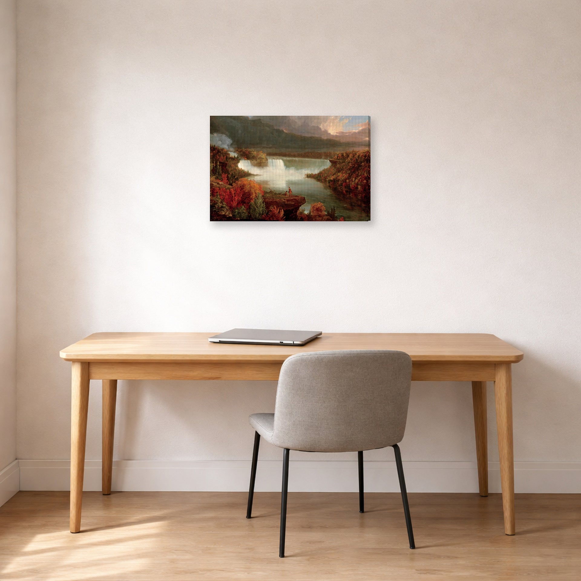 Gallery-wrapped canvas print of Thomas Cole's Distant View of Niagara Falls displayed on a wall in a office