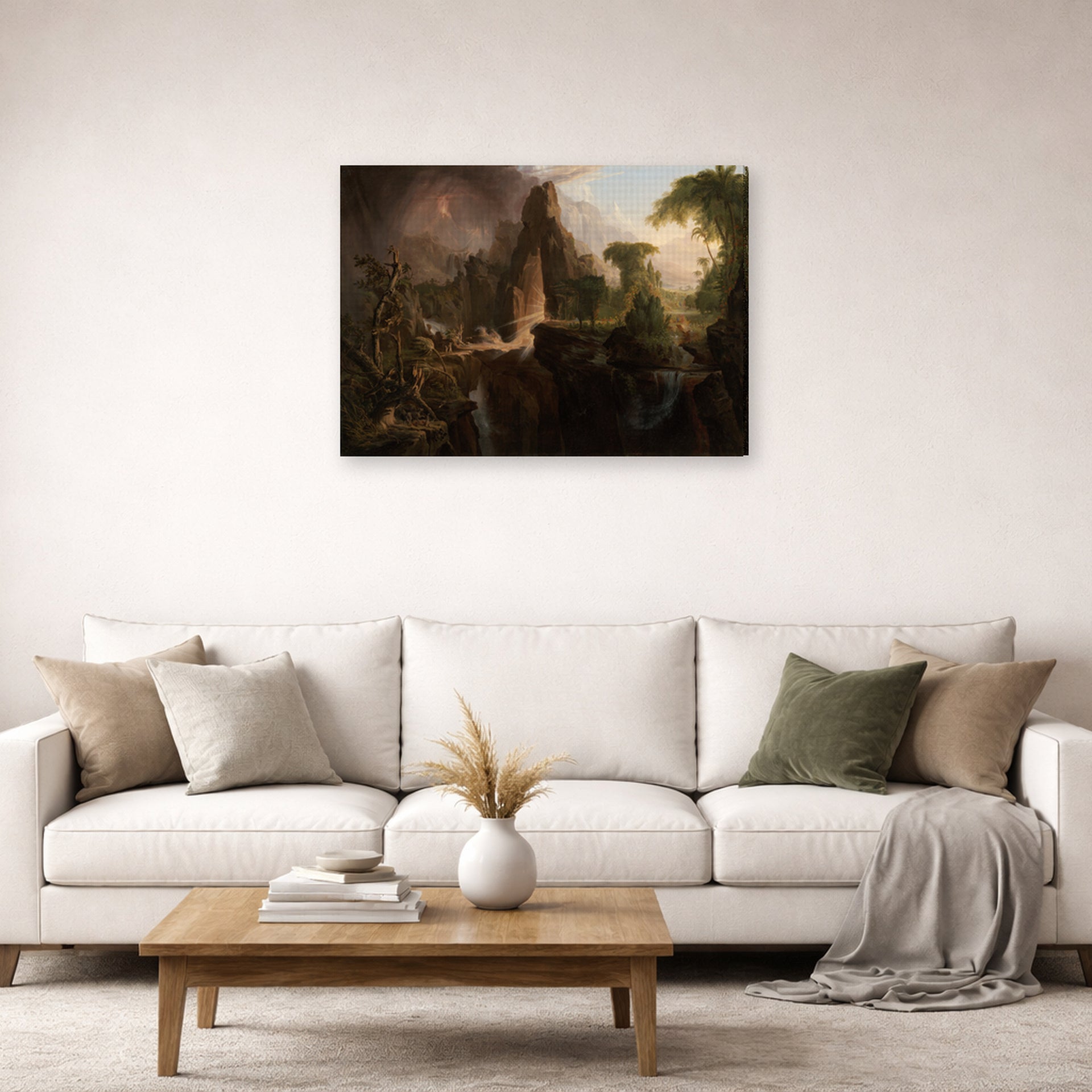 Gallery-wrapped canvas print of Thomas Cole's Expulsion from the Garden of Eden displayed on a wall in a living room