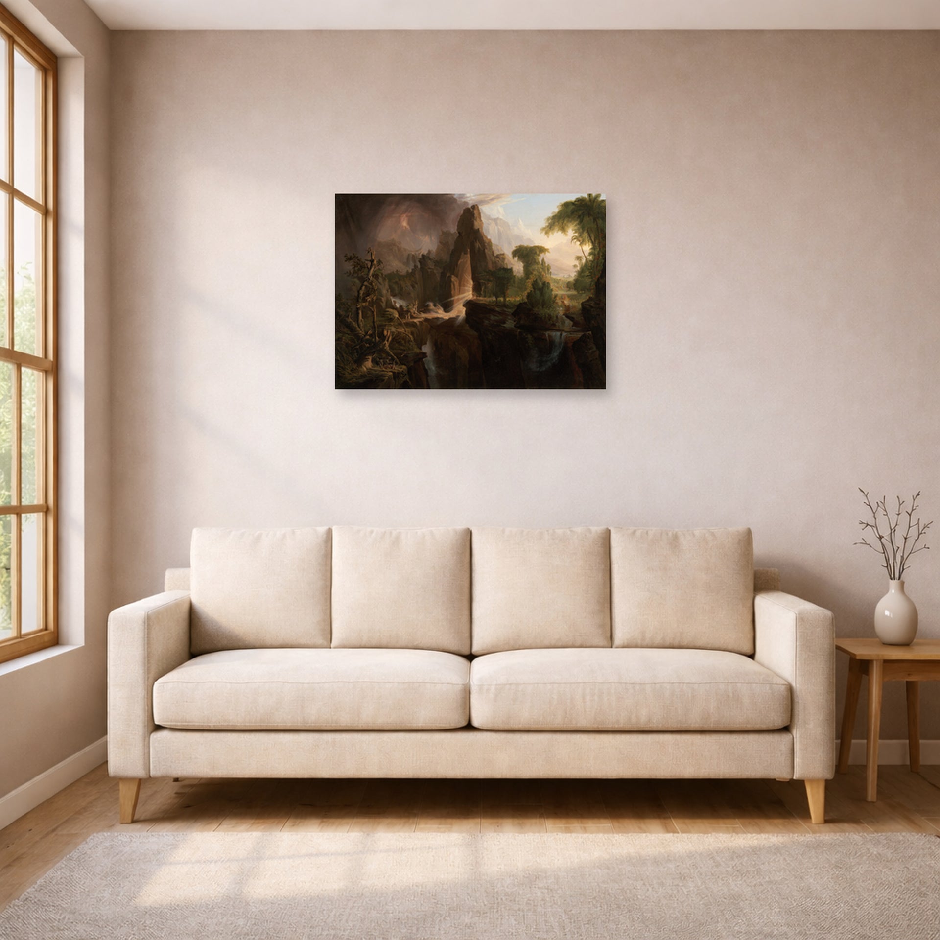 Unframed poster print of Thomas Cole's Expulsion from the Garden of Eden displayed on a wall in a living room