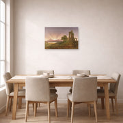 Unframed poster print of Thomas Cole's Gothic Ruins displayed on a wall in a dining room