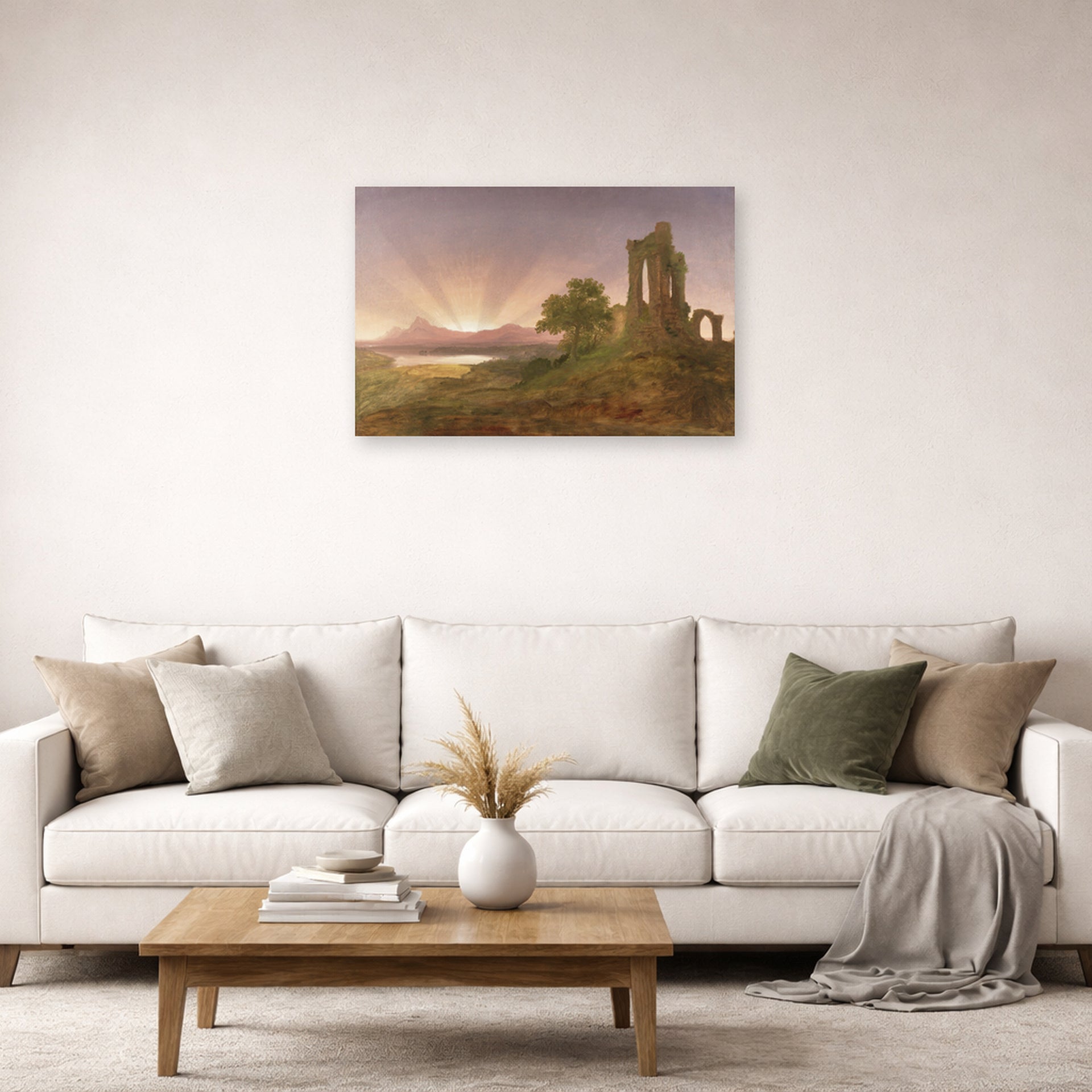 Unframed poster print of Thomas Cole's Gothic Ruins displayed on a wall in a living room