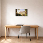 Gallery-wrapped canvas print of Thomas Cole's The Architect's Dream displayed on a wall in a office