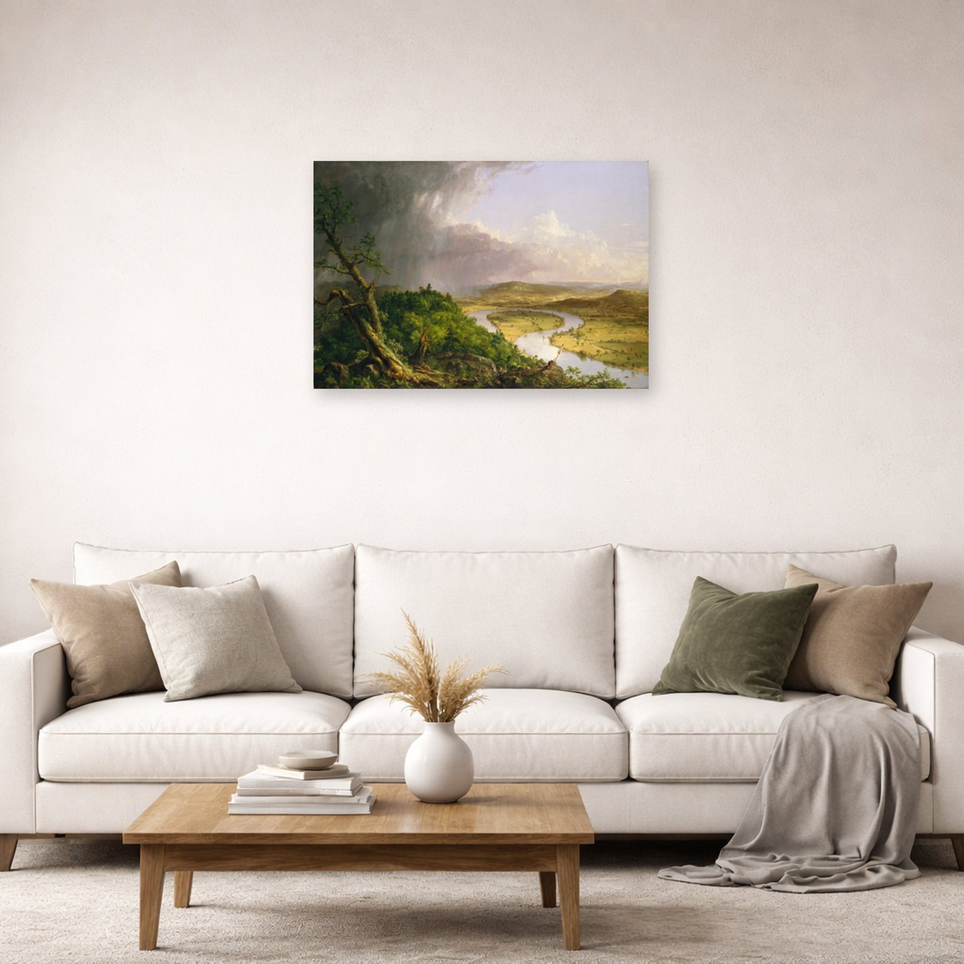 Unframed poster print of Thomas Cole's The Oxbow (The Connecticut River near Northampton 1836) displayed on a wall in a living room