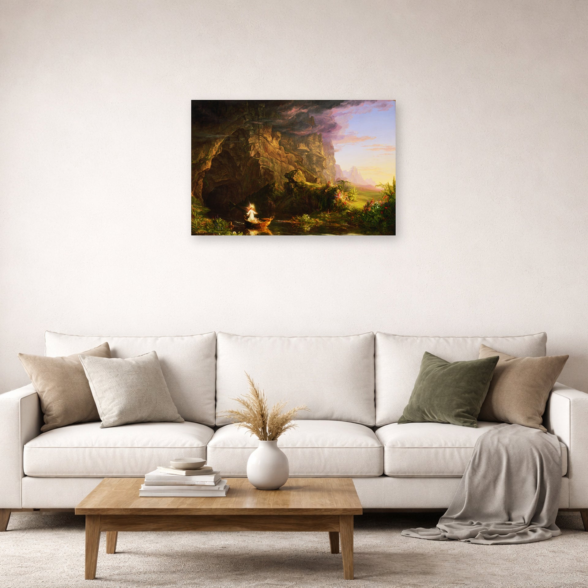 Unframed poster print of Thomas Cole's The Voyage of Life (Childhood) displayed on a wall in a living room