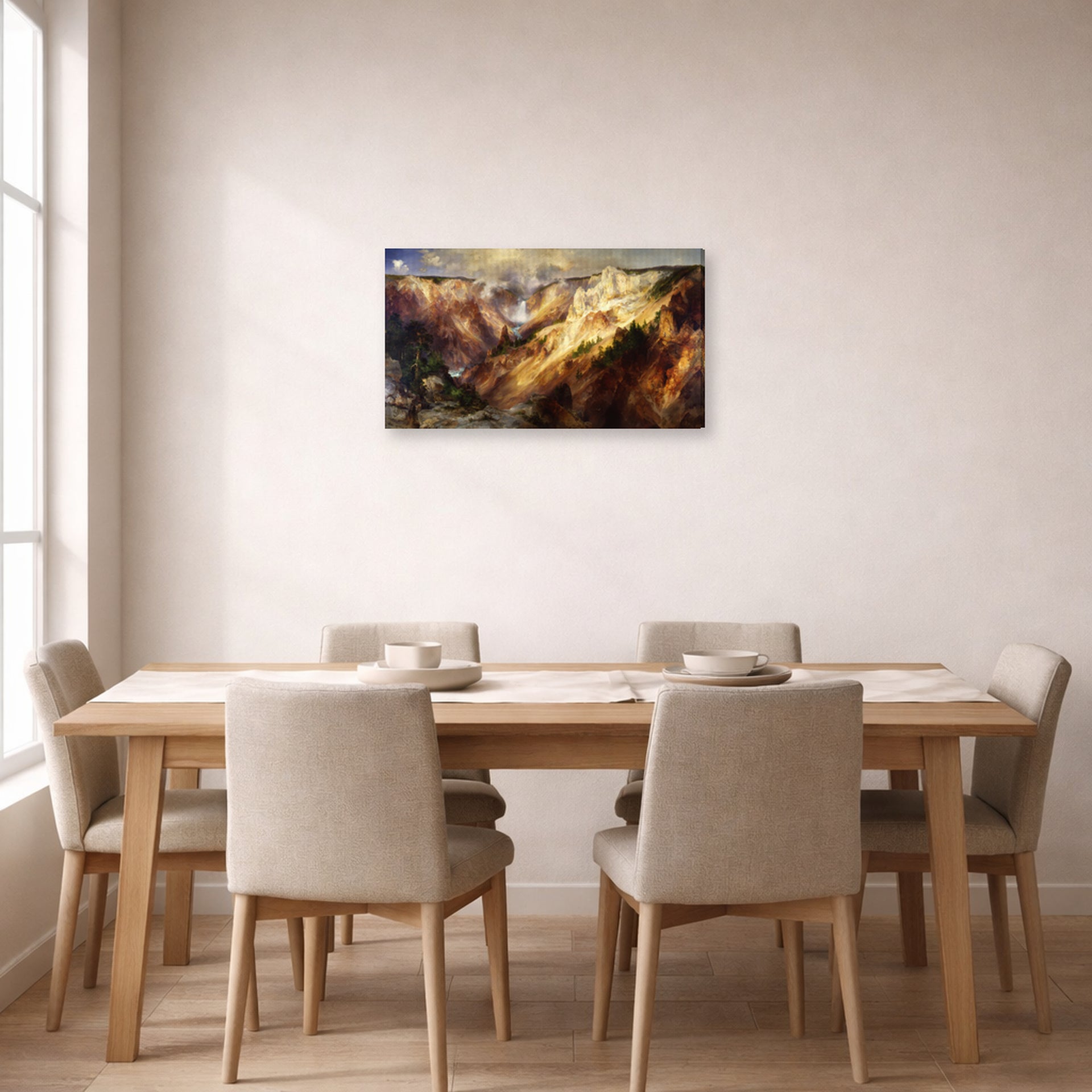 Gallery-wrapped canvas print of Thomas Moran's Grand Canyon of Yellow Stone displayed on a wall in a dining