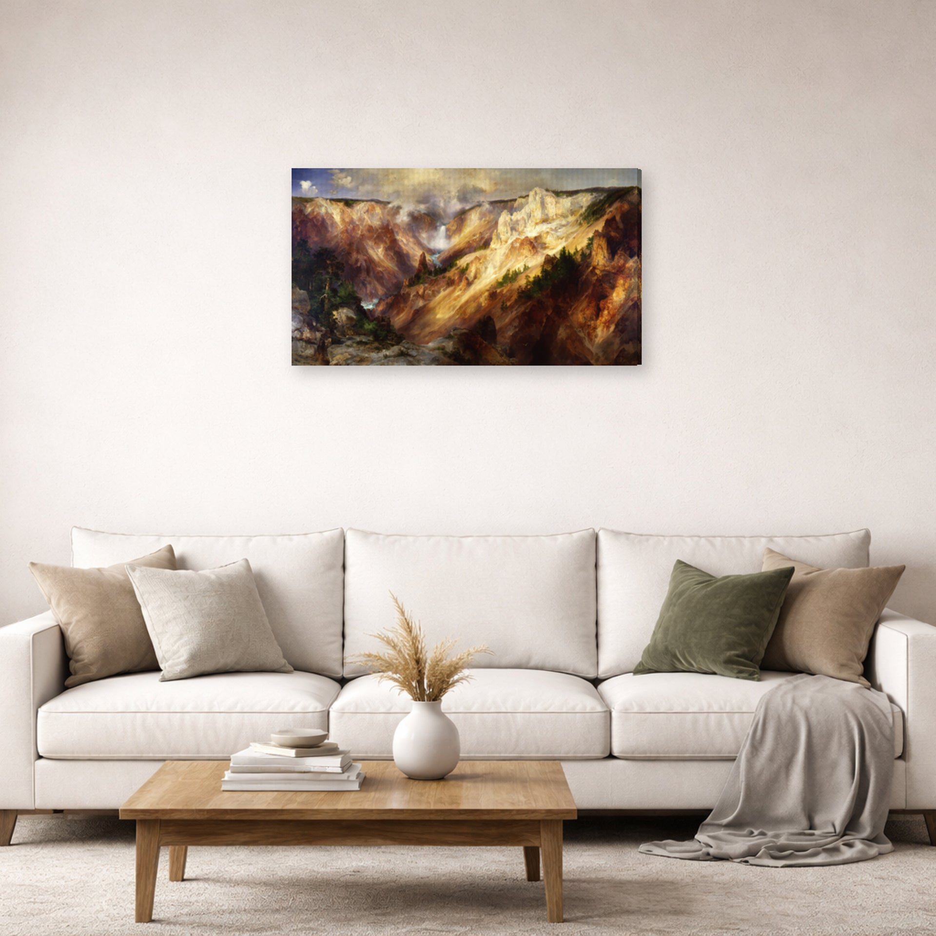 Gallery-wrapped canvas print of Thomas Moran's Grand Canyon of Yellow Stone displayed on a wall in a living room