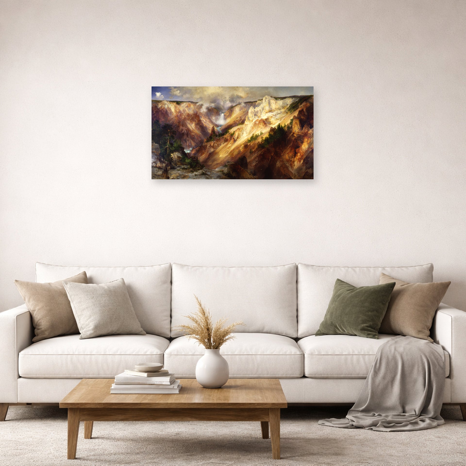 Unframed poster print of Thomas Moran's Grand Canyon of Yellow Stone displayed on a wall in a living room