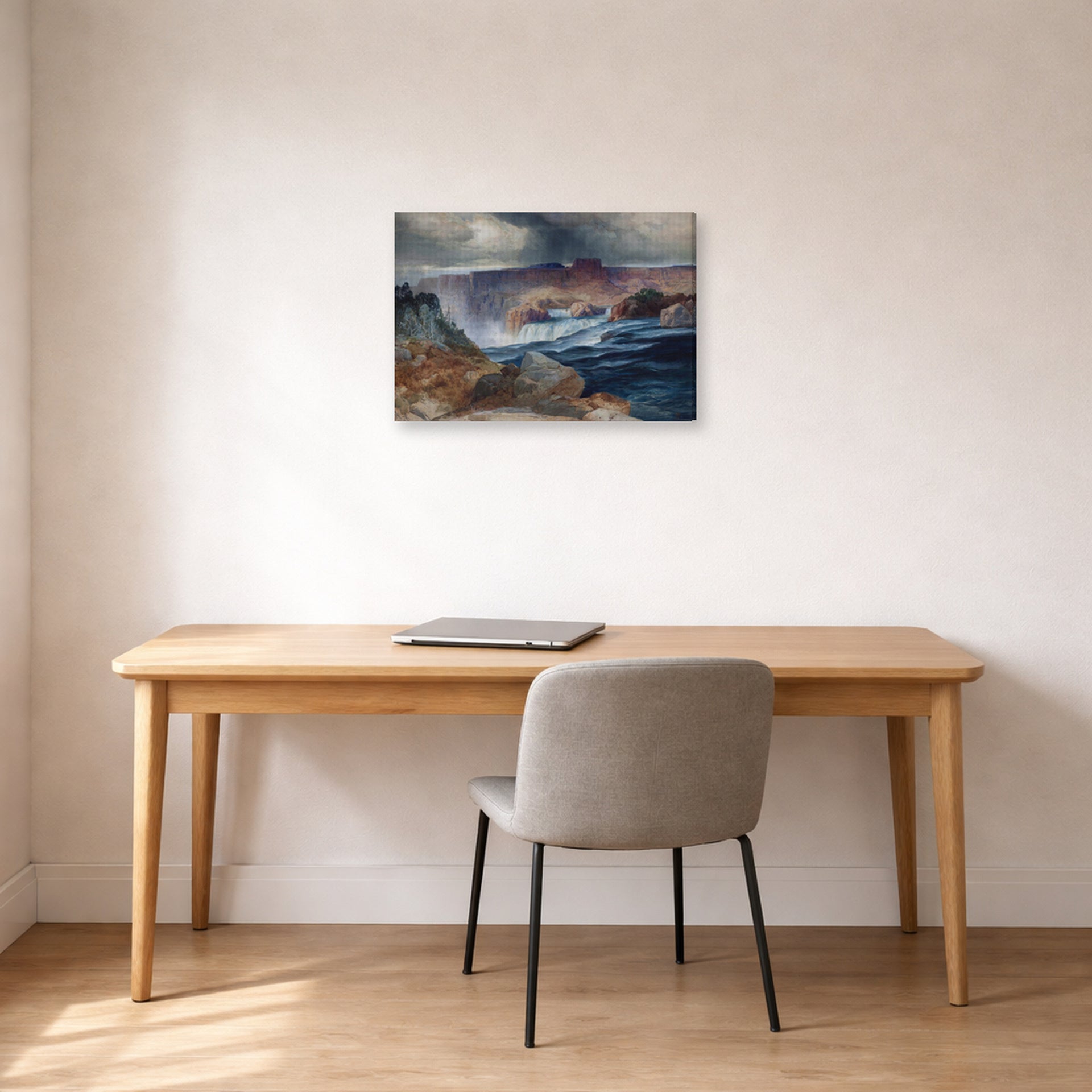 Gallery-wrapped canvas print of Thomas Moran's Shoshone Falls, Idaho displayed on a wall in a office