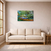 Gallery-wrapped canvas print of Vincent van Gogh's Bank of the Oise at Auvers displayed on a wall in a living room