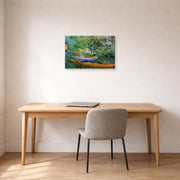 Gallery-wrapped canvas print of Vincent van Gogh's Bank of the Oise at Auvers displayed on a wall in a home office