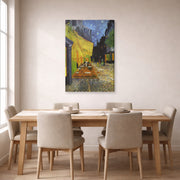 Gallery-wrapped canvas print of Vincent van Gogh's Cafe Terrace at Night displayed on a wall in a dining room