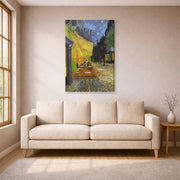 Gallery-wrapped canvas print of Vincent van Gogh's Cafe Terrace at Night displayed on a wall in a living room