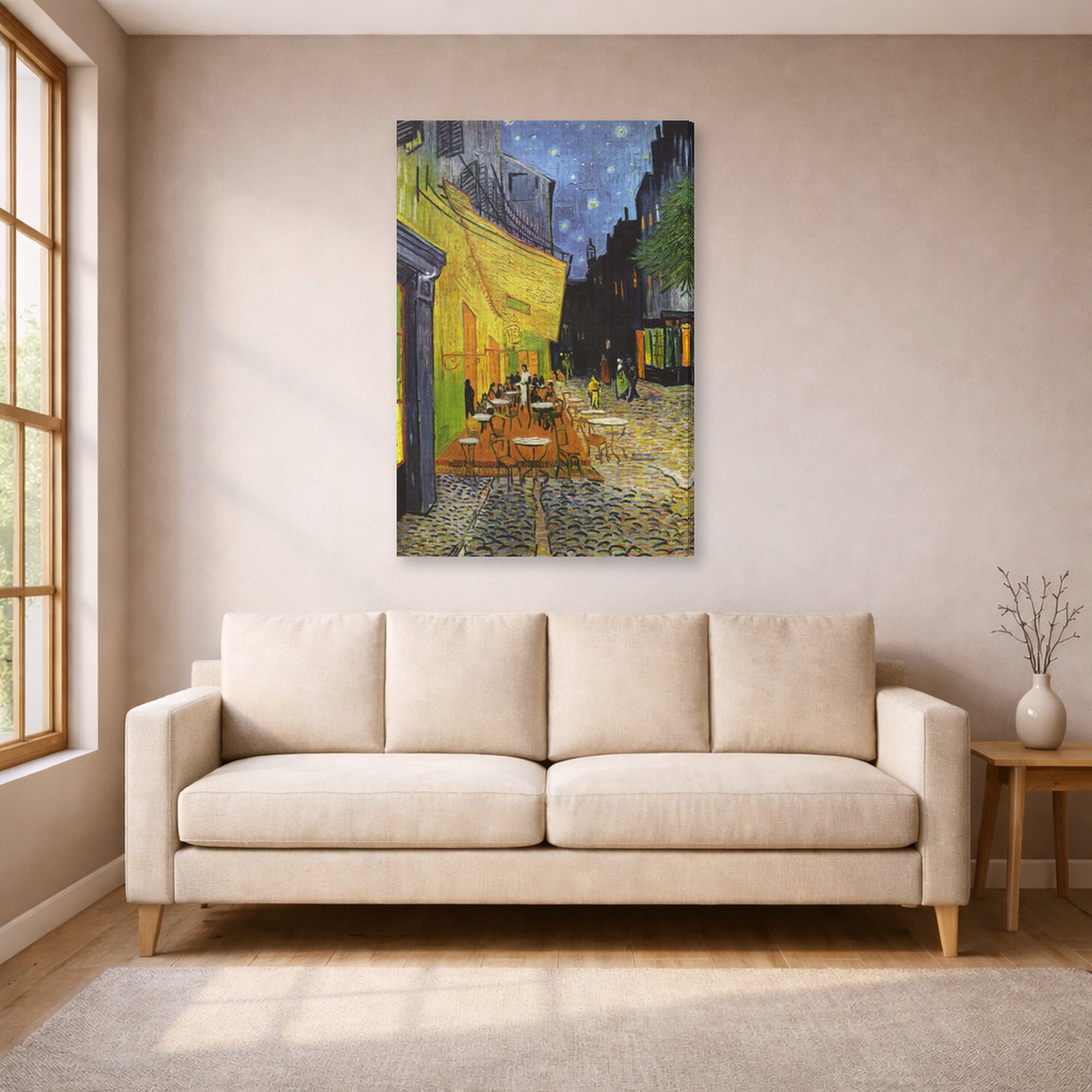 Gallery-wrapped canvas print of Vincent van Gogh's Cafe Terrace at Night displayed on a wall in a living room