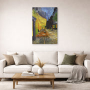 Gallery-wrapped canvas print of Vincent van Gogh's Cafe Terrace at Night displayed on a wall in a living room