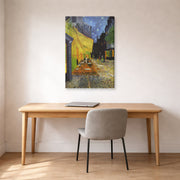 Gallery-wrapped canvas print of Vincent van Gogh's Cafe Terrace at Night displayed on a wall in a home office