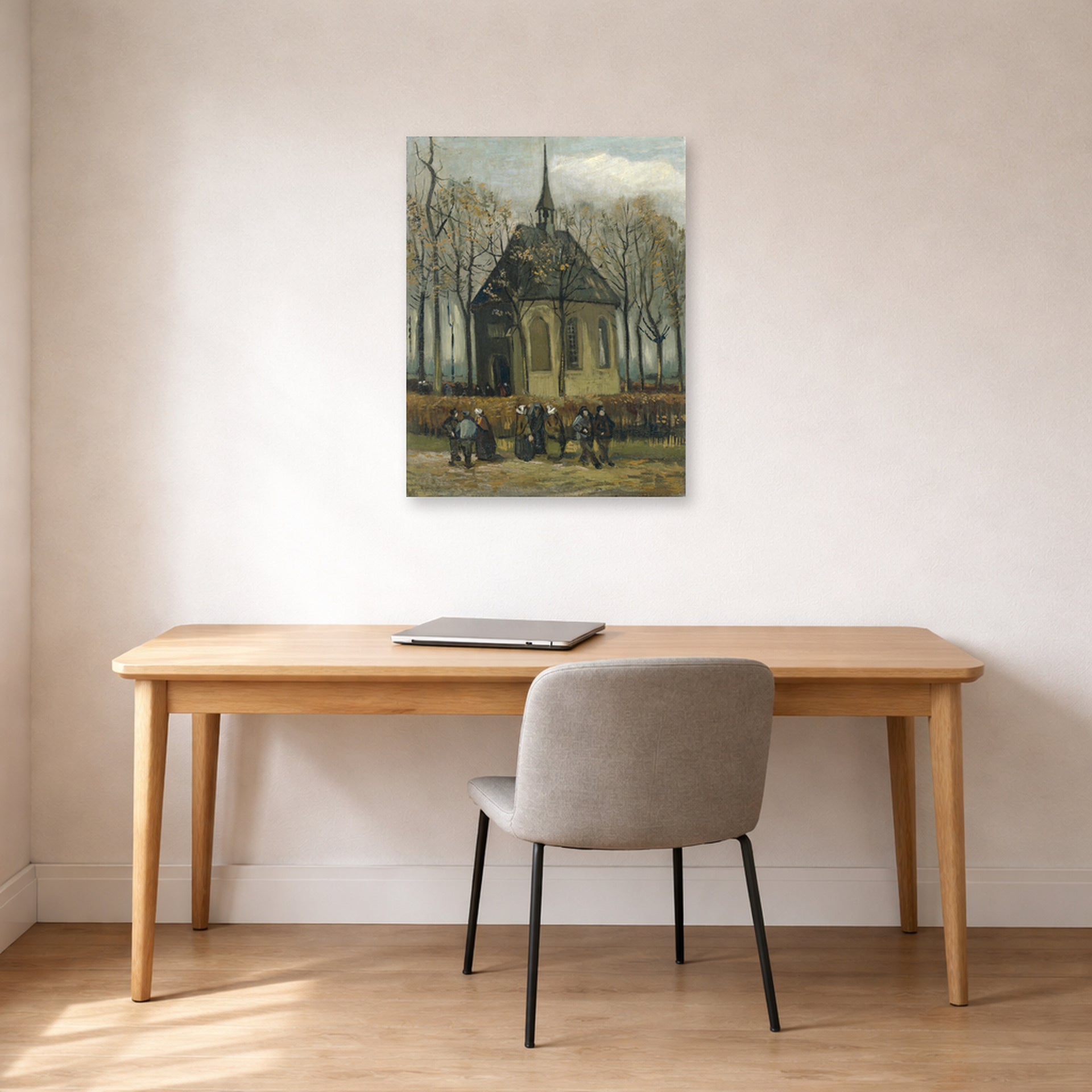 Unframed poster print of Vincent van Gogh's Congregation Leaving the Reformed Church in Nuenen displayed on a wall in a home office