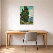 Unframed poster print of Vincent van Gogh's Cypresses displayed on a wall in a home office