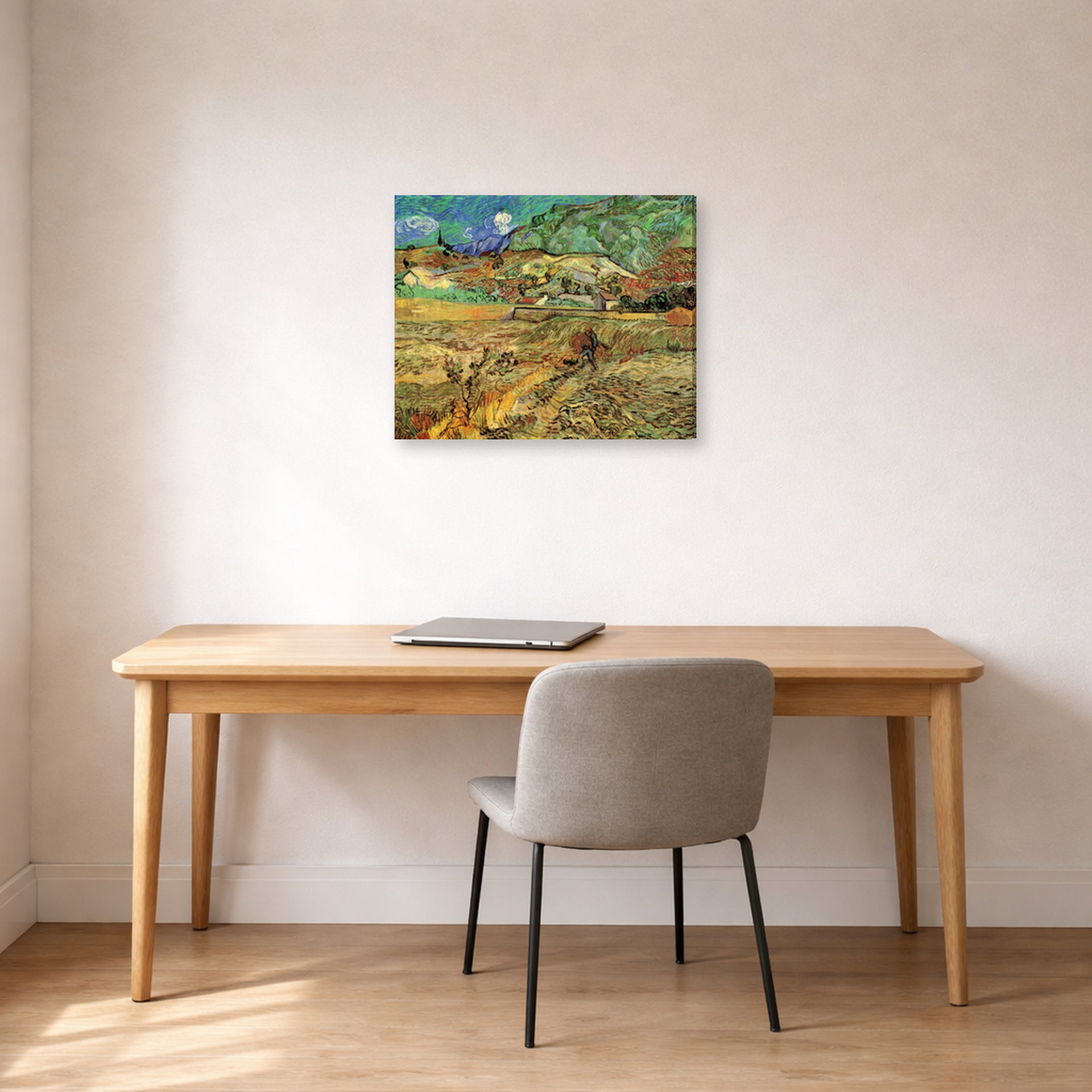 Gallery-wrapped canvas print of Vincent van Gogh's Enclosed Wheat Field with Peasant displayed on a wall in a home office