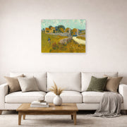 Unframed poster print of Vincent van Gogh's Farmhouse in Provence displayed on a wall in a living room