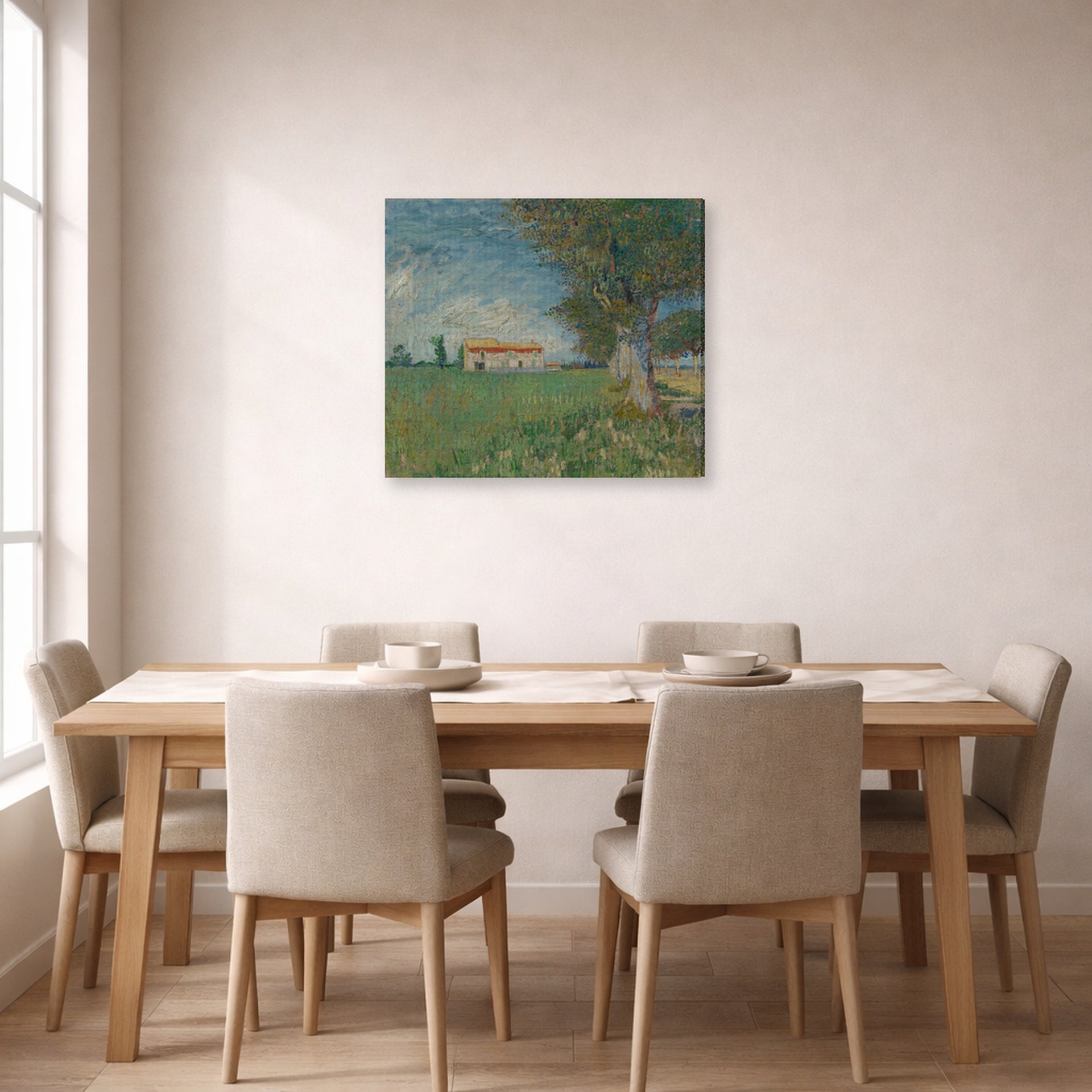 Gallery-wrapped canvas print of Vincent van Gogh's Farmhouse in a Wheatfield displayed on a wall in a dining room
