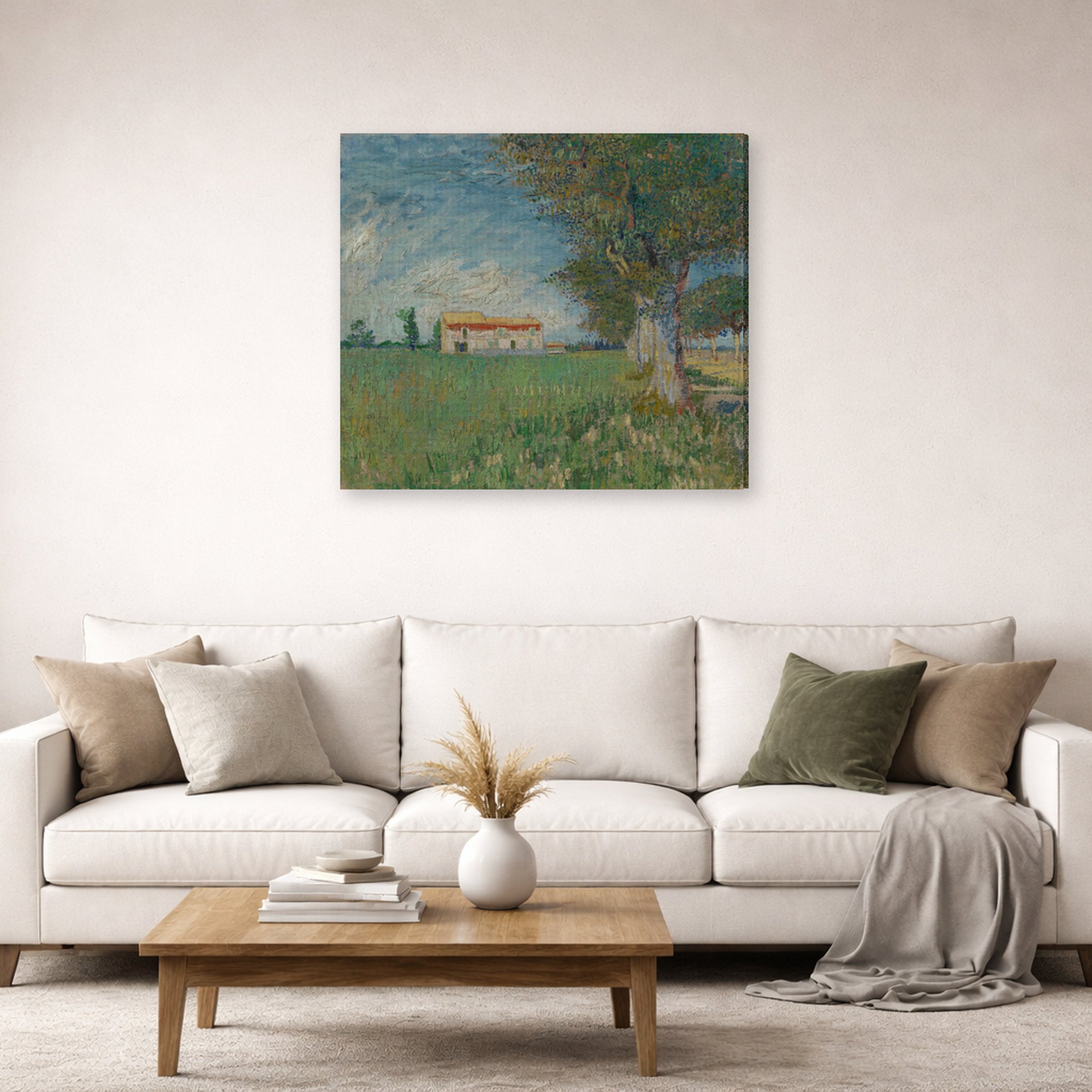 Gallery-wrapped canvas print of Vincent van Gogh's Farmhouse in a Wheatfield displayed on a wall in a living room